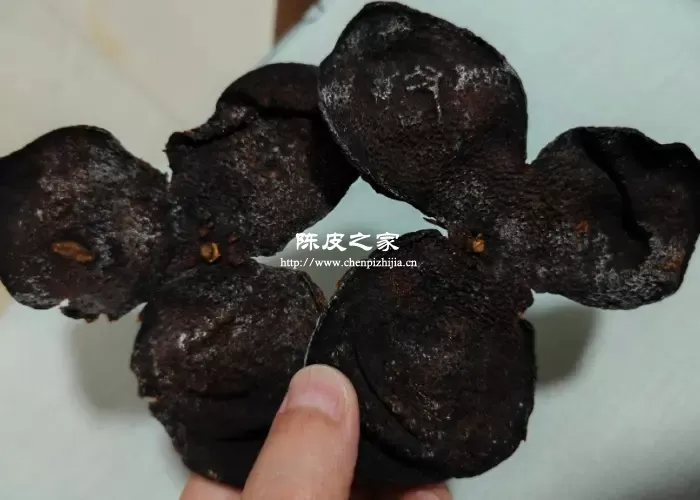 新会陈皮表面上黑色是怎回事